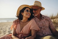 Latinx couple beach sunglasses laughing. AI generated Image by rawpixel.