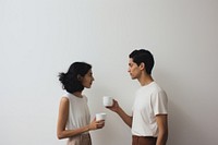 Latinx couple drinking arguing coffee. AI generated Image by rawpixel.