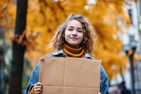 Teenage woman cardboard holding box. AI generated Image by rawpixel.
