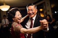 East asian couple dancing in the party celebration laughing portrait. AI generated Image by rawpixel.