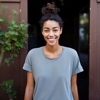 A girl with bun hair t-shirt smile happy. AI generated Image by rawpixel.