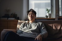 East asian man Korean senior furniture sitting. AI generated Image by rawpixel.