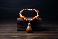 Necklace jewelry table bead. AI generated Image by rawpixel.