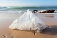 Plastic bag on the beach dress gown tranquility. AI generated Image by rawpixel.