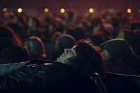 Male in crowd of fans feeling sleepy adult performance auditorium. AI generated Image by rawpixel.