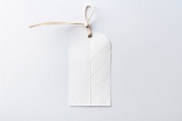 Price tag paper label leaf shape white art white background. AI generated Image by rawpixel.