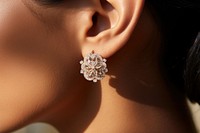 Round cut diamonds earring gemstone jewelry luxury. AI generated Image by rawpixel.