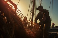 Men working on fishing net using an anchor on fishing ship industry outdoors adult. 