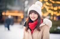 Female japanese student wearing christmas hat scarf adult smile. AI generated Image by rawpixel.