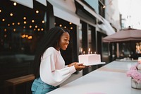 African American woman party birthday outdoors. AI generated Image by rawpixel.