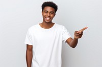 Index finger on your white t-shirt standing pointing portrait. AI generated Image by rawpixel.