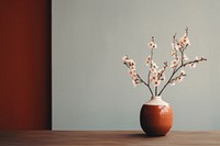 A flower vase placed on a wooden table decoration plant houseplant. AI generated Image by rawpixel.