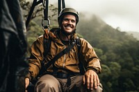 Freedom adult Man Tourist Wearing Casual Clothing On Zip Line Or Canopy Experience In Laos Rain Forest adventure clothing forest. AI generated Image by rawpixel.