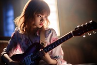 Young girl playing electreic guitar musician entertainment performance. AI generated Image by rawpixel.