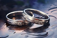 Two silver wedding rings jewelry celebration accessories. 