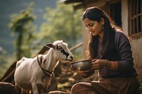 Nepalese adult woman livestock mammal animal. AI generated Image by rawpixel.