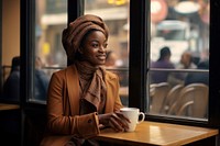 Nigerian woman sitting cup holding. AI generated Image by rawpixel.