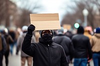 Middle-aged black man holding a blank cardboard sign protest adult architecture. AI generated Image by rawpixel.