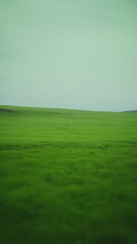 Neon green grassland landscape outdoors horizon. AI generated Image by rawpixel.