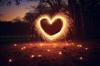 Heart sparkler sparks light. AI generated Image by rawpixel.