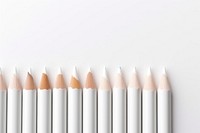 White color pencil cosmetics white background arrangement. AI generated Image by rawpixel.
