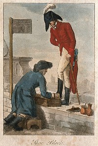 A soldier in uniform is having his boots cleaned in the street by a man kneeling in a box. Coloured aquatint with etching.