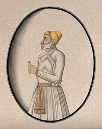 A Mughal courtier with a yellow turban holds an ornament . Watercolour drawing by an Indian artist.
