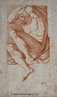 A seated nude male figure seen from the left. Red chalk drawing.