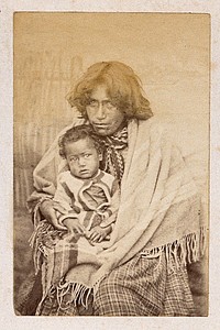 New Zealand: a Maori woman and child. Albumen print.
