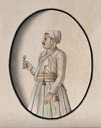 A Mughal courtier holding a flower. Watercolour drawing by an Indian artist.
