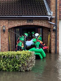 Rescue team in flooded area,  January 21, 2021, UK. Original public domain image from Flickr