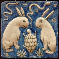 Tile with two rabbits, two snakes and a tortoise. Illustration for Zakariya al-Qazwini's book, Marvels of Things Created and Miraculous Aspects of Things Existing (13th century). Earthenware, molded and underglaze-painted decoration. Iran, 19th century.