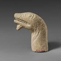 Limestone head of a snake