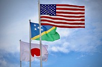 Flag of Japan, Solomon Islands and the USA.