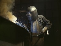 Welder making boilers for a ship, Combustion Engineering Co., Chattanooga, Tenn.