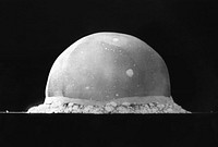 PA-98-0520 — Trinity Site explosion, 0.016 second after explosion, July 16, 1945. The viewed hemisphere's highest point in this image is about 200 meters high.