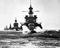 The U.S. Navy battleship USS Pennsylvania (BB-38) leads USS Colorado (BB-45), USS Louisville (CA-28), USS Portland (CA-33), and USS Columbia (CL-56) into Lingayen Gulf before the landing on Luzon, Philippines in January 1945. Battleships and other big gun naval vessels that served in the Pacific Theatre during World War II were used primarily for offshore bombardment of enemy positions and as anti-aircraft screens for aircraft carriers.The wartime censor has removed Pennsylvania´s radar antennas.