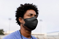 Male athlete wearing mask in the new normal 