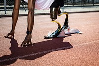 Paralympic sprinter with prosthetic legs started racing from a starting block 