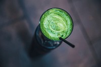 Free healthy green drink with a straw top view photo, public domain beverage CC0 image.