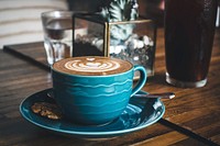 Free flat white coffee, latte mug on wooden table photo, public domain beverage CC0 image.