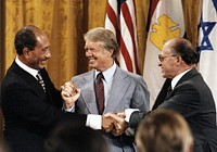 Sadat and Begin and their delegations at Camp David, September 17, 1978 (Photo courtesy of Jimmy Carter Library). Original public domain image from Flickr