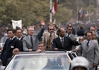 Carter and Sadat ride in a motorcade through Cairo, March 8, 1979 (Photo courtesy of Jimmy Carter Library). Original public domain image from Flickr