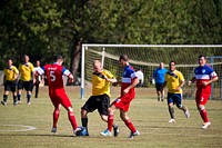 South Carolina Air National Guard in yellow jerseys play soccer against Colombian Air Force in red jerseys in Rionegro, Colombia during Relampago. (U.S. Air National Guard photo by Tech. Sgt. Jorge Intriago/Released). Original public domain image from Flickr