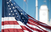 American flag waving with the wind. Original public domain image from Flickr