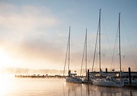 Sailing boats near the pier. Original public domain image from Flickr