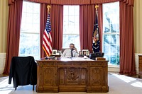 President Barack Obama talks on the phone with President Beji Caid Essebsi of Tunisia during a foreign leader call in the Oval Office, Jan. 5, 2015.