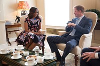 First Lady Michelle Obama meets with Prince Harry for tea to discuss the "Let Girls Learn" initiative and support for veterans, at Kensington Palace in London, England, June 16, 2015.