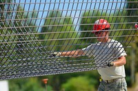 U.S. Air Force Tech. Sgt. Justin Bell, a heavy equipment operator with the 200th REDHORSE Squadron, Ohio Air National Guard, guides a sheet of rebar being lowered for the rebar cage used in foundation of a multi-purpose building being constructed in support of a Deployment for Training in Israel, July 1, 2015.