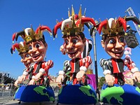 Joker puppets in parade. Free public domain CC0 photo.